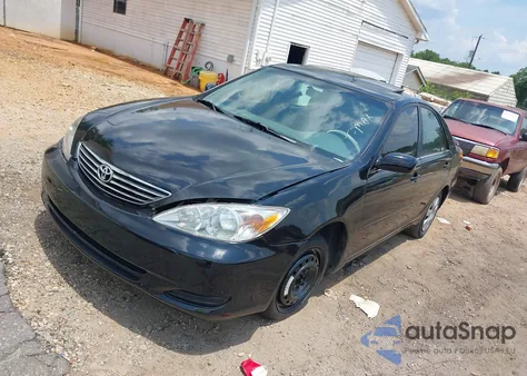 2002 Toyota Camry Le from USA, damaged, VIN 4T1BE30K92U091788